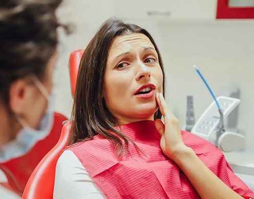 Woman at the dentist with a toothache